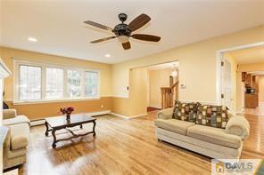 18 Devon Road Edison, NJ 08820 - Photo 7 of 25 a living room with furniture and a window