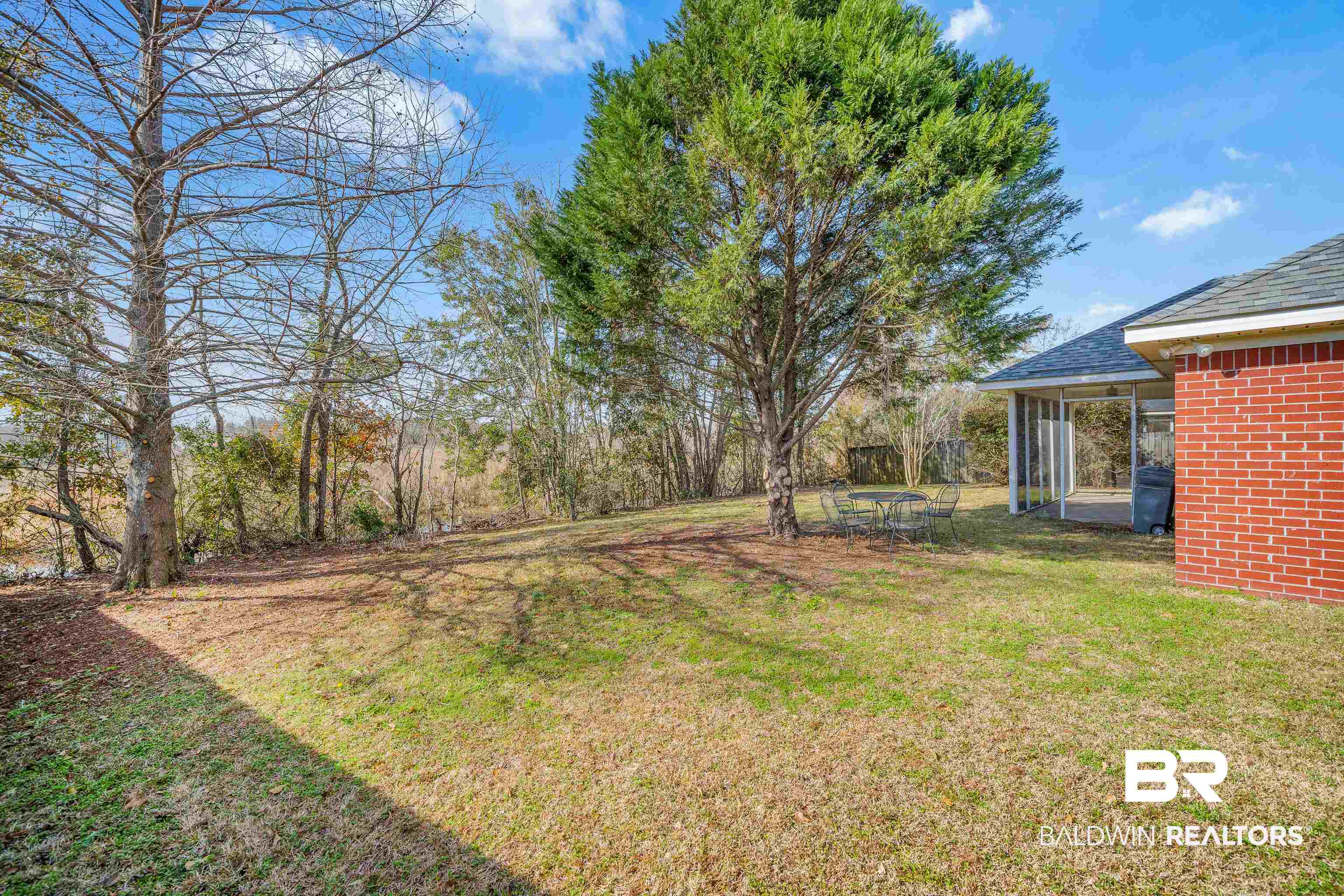 9243 Brookshire Loop Daphne, AL 36526 - Photo 24 of 26 View of yard featuring a sunroom