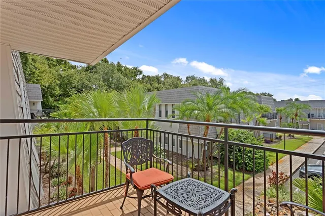 a view of a chairs in a balcony