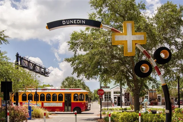 a sign broad on the side of the road