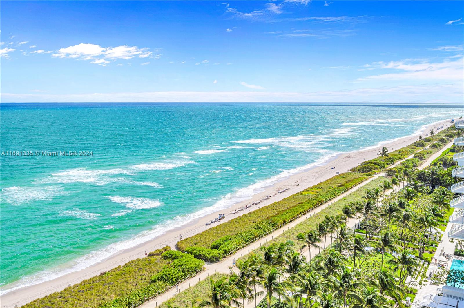 9111 Collins Avenue, Unit NPH6 Surfside, FL 33154 - Photo 25 of 66 a view of an ocean from a balcony