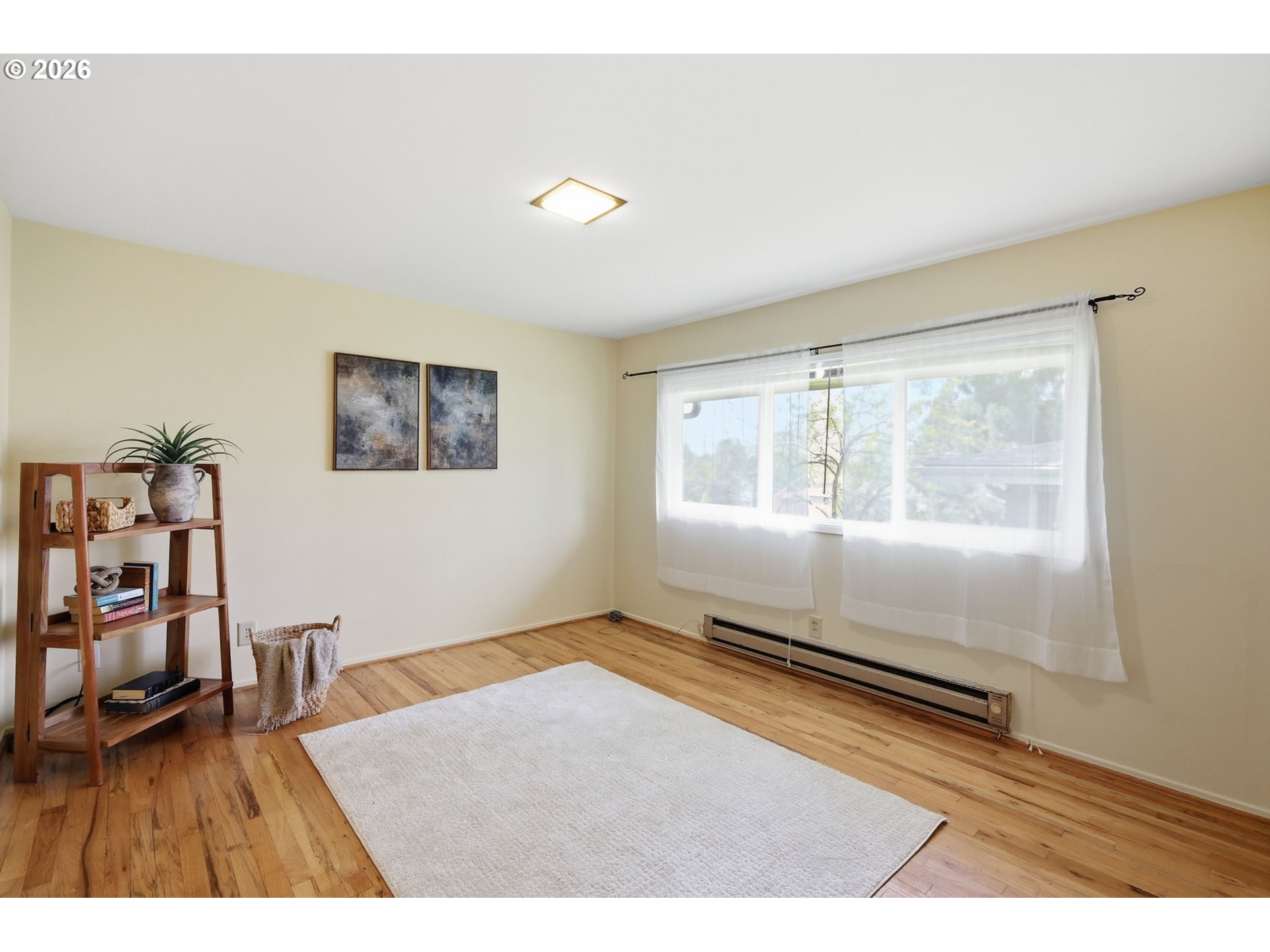 3025 Harris Street Eugene, OR 97405 - Photo 23 of 44 a living room with furniture and a window