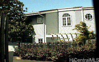 1 Coelho Way, Unit 8 Honolulu, HI 96817 - Photo 1 of 1 a view of a house with a yard and potted plants