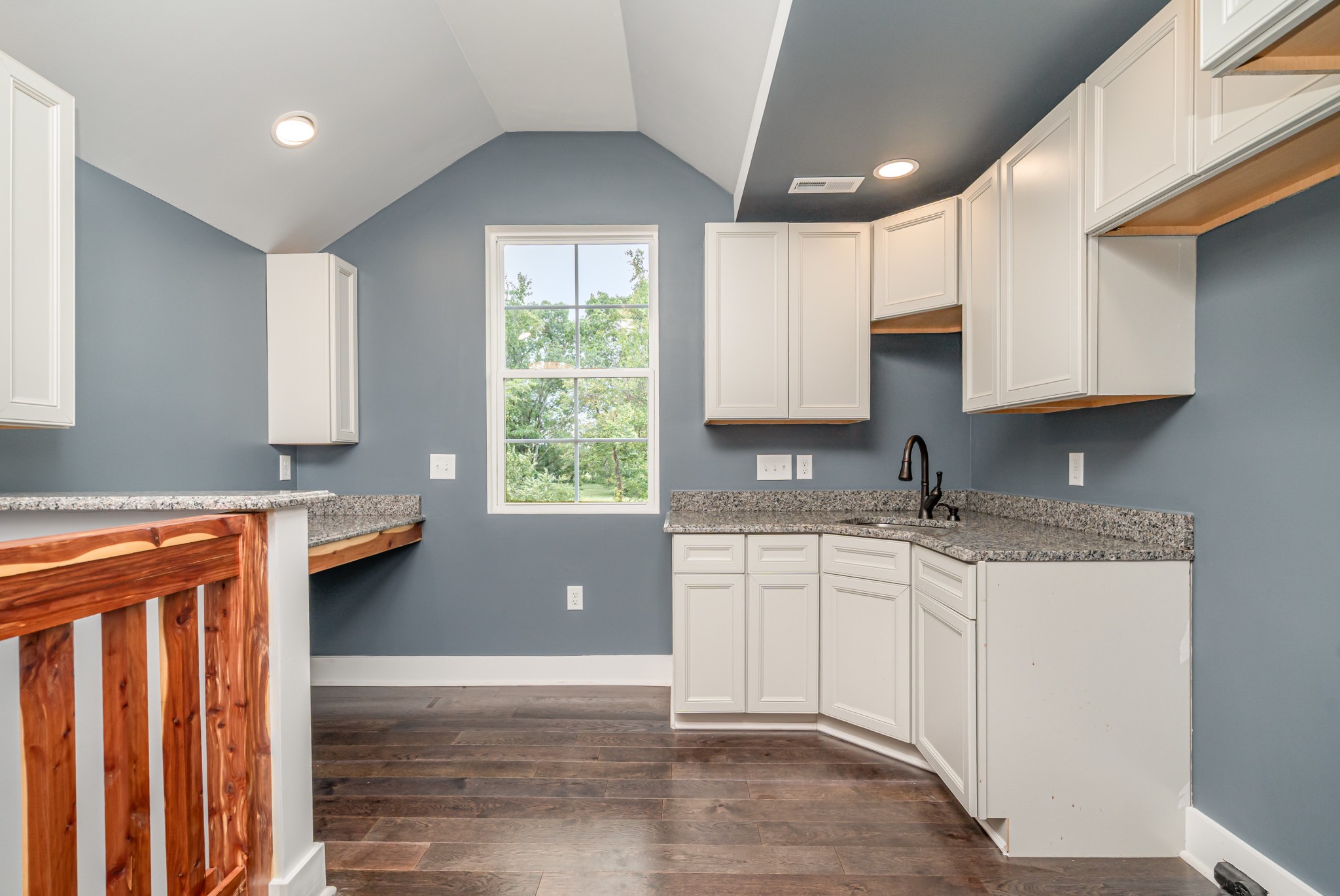 5837 Rocky Mound Road Westmoreland, TN 37186 - Photo 22 of 41 a kitchen with stainless steel appliances granite countertop a sink stove and cabinets