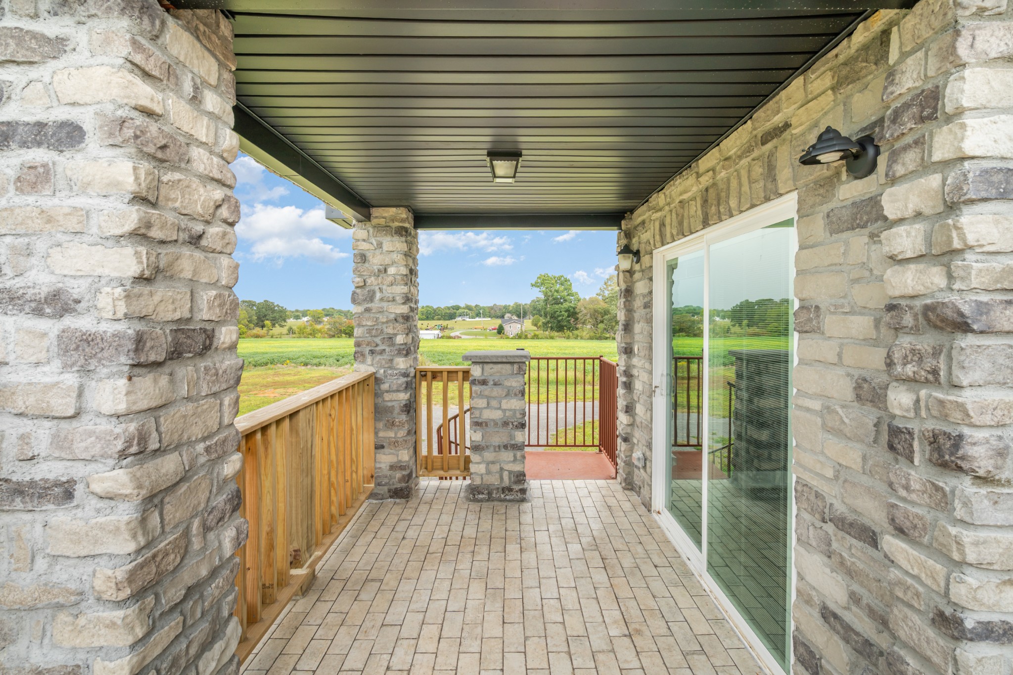 5837 Rocky Mound Road Westmoreland, TN 37186 - Photo 39 of 41 a view of a balcony with wooden floor