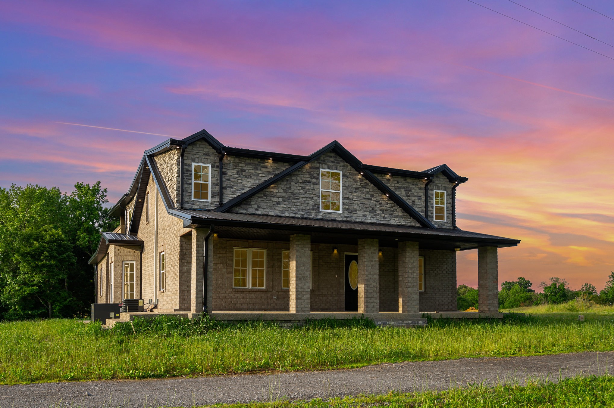 5837 Rocky Mound Road Westmoreland, TN 37186 - Photo 4 of 41 a front view of a house with garden