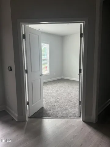 a bathroom with a bathtub and a toilet