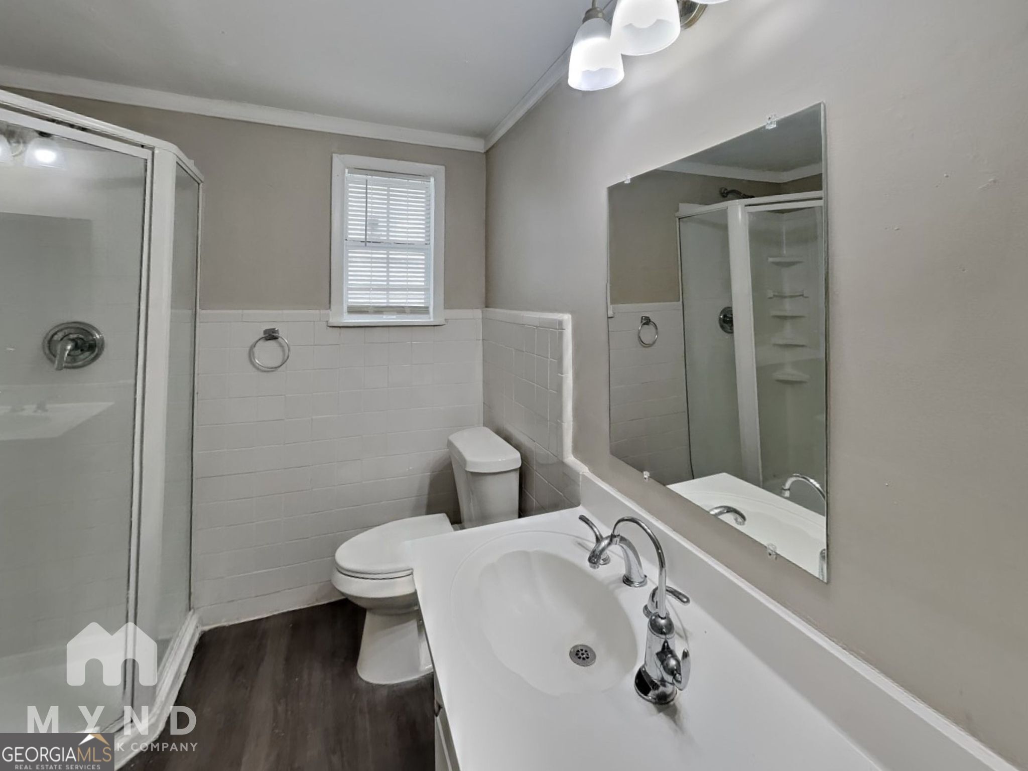 1284 Westmont Road Southwest Atlanta, GA 30311 - Photo 11 of 20 a bathroom with a sink a toilet and shower