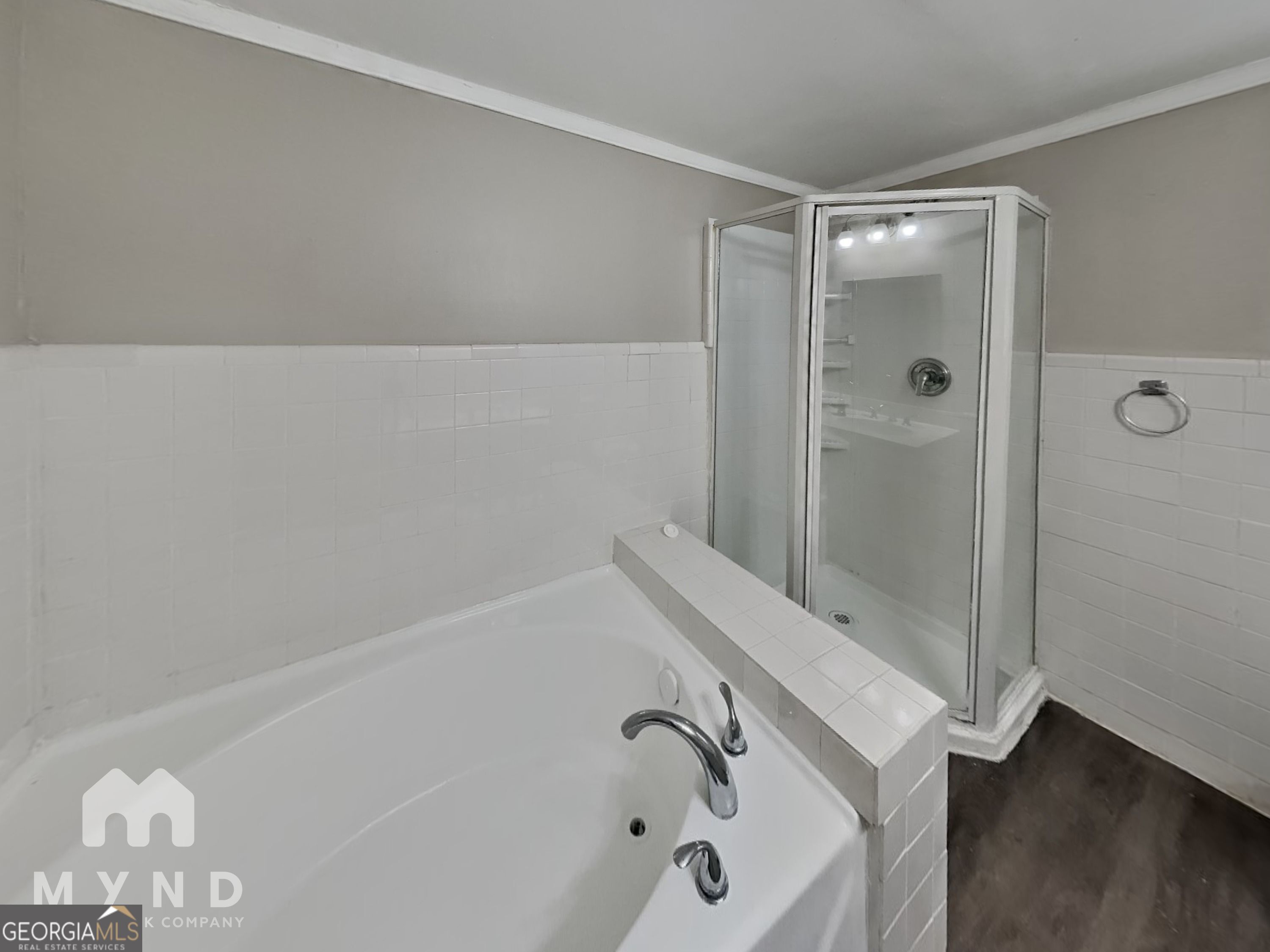 1284 Westmont Road Southwest Atlanta, GA 30311 - Photo 12 of 20 a bathroom with a bathtub and shower