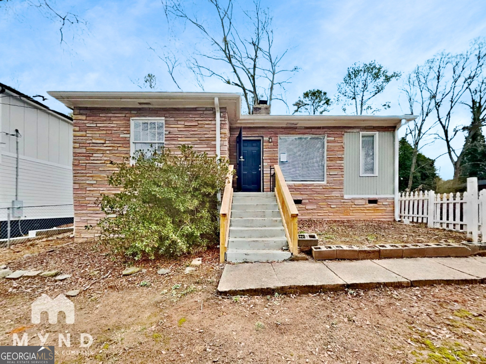 1284 Westmont Road Southwest Atlanta, GA 30311 - Photo 18 of 20 a view of a house with a yard