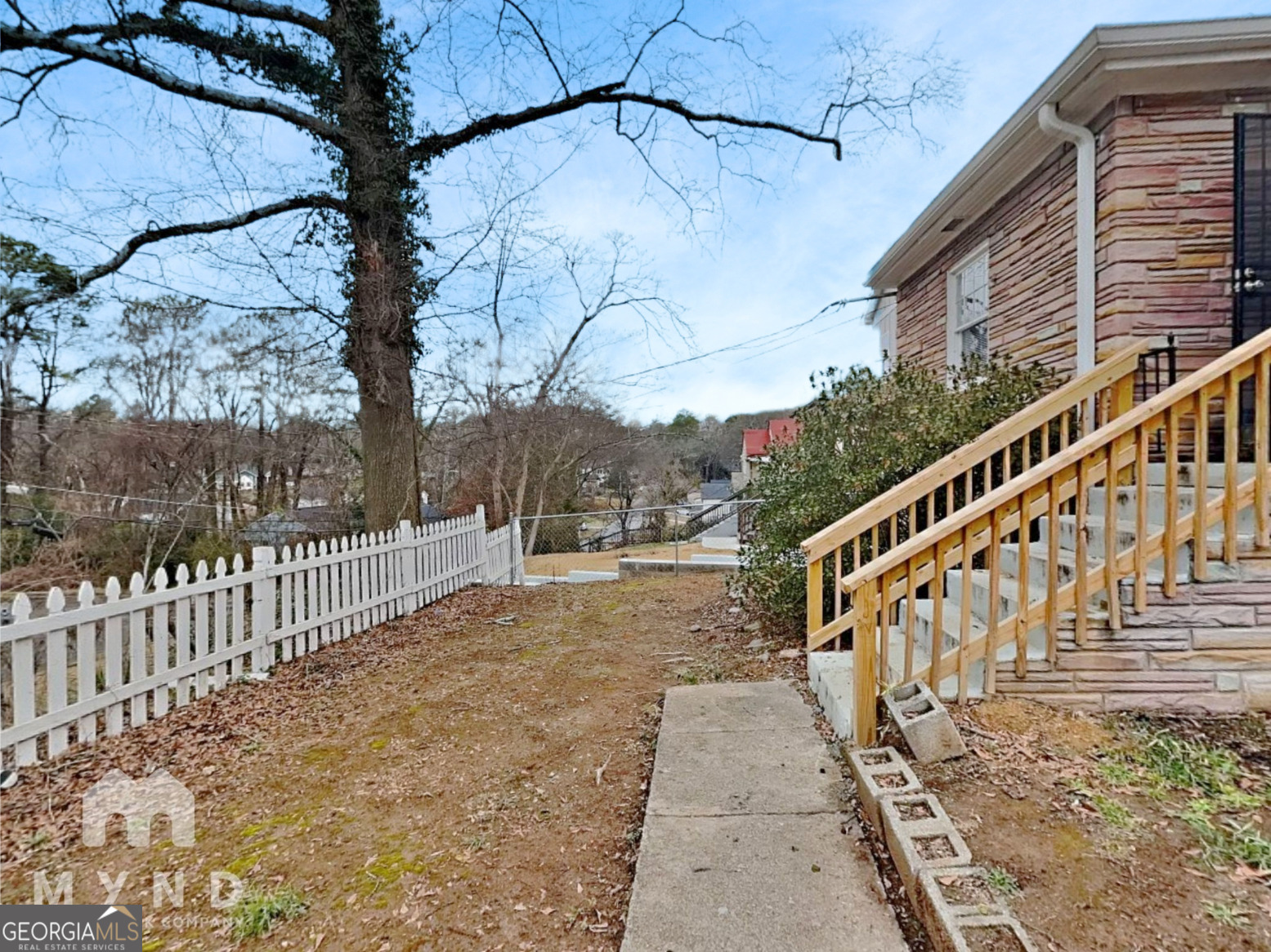1284 Westmont Road Southwest Atlanta, GA 30311 - Photo 19 of 20 a view of a house with a small yard
