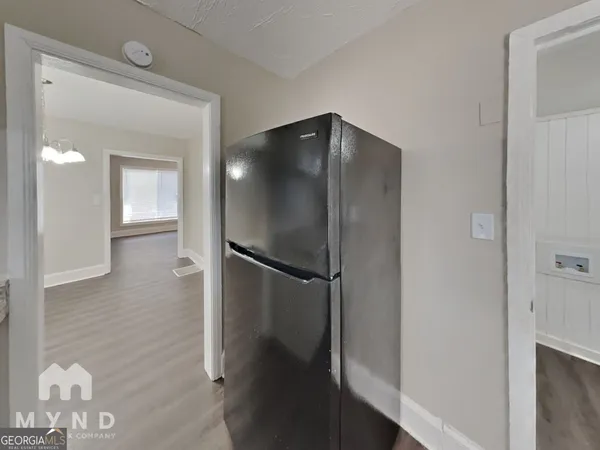 a bathroom with a shower and a mirror