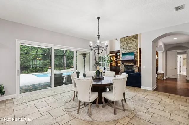 a kitchen with stainless steel appliances kitchen island granite countertop a sink and cabinets