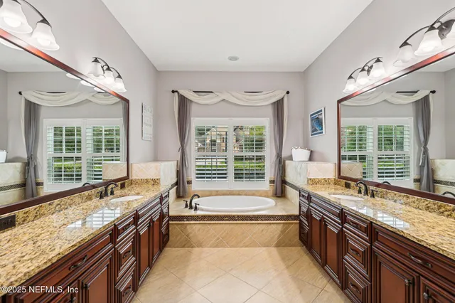 a bedroom with a bed and dresser