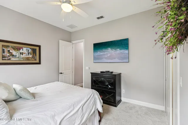 a bedroom with furniture and a bed