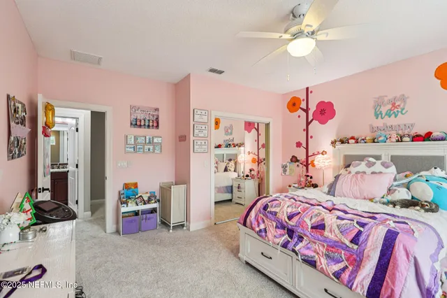 a room with furniture and a flat screen tv