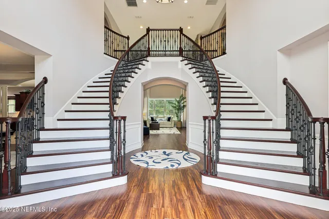a view of entryway with wooden floor