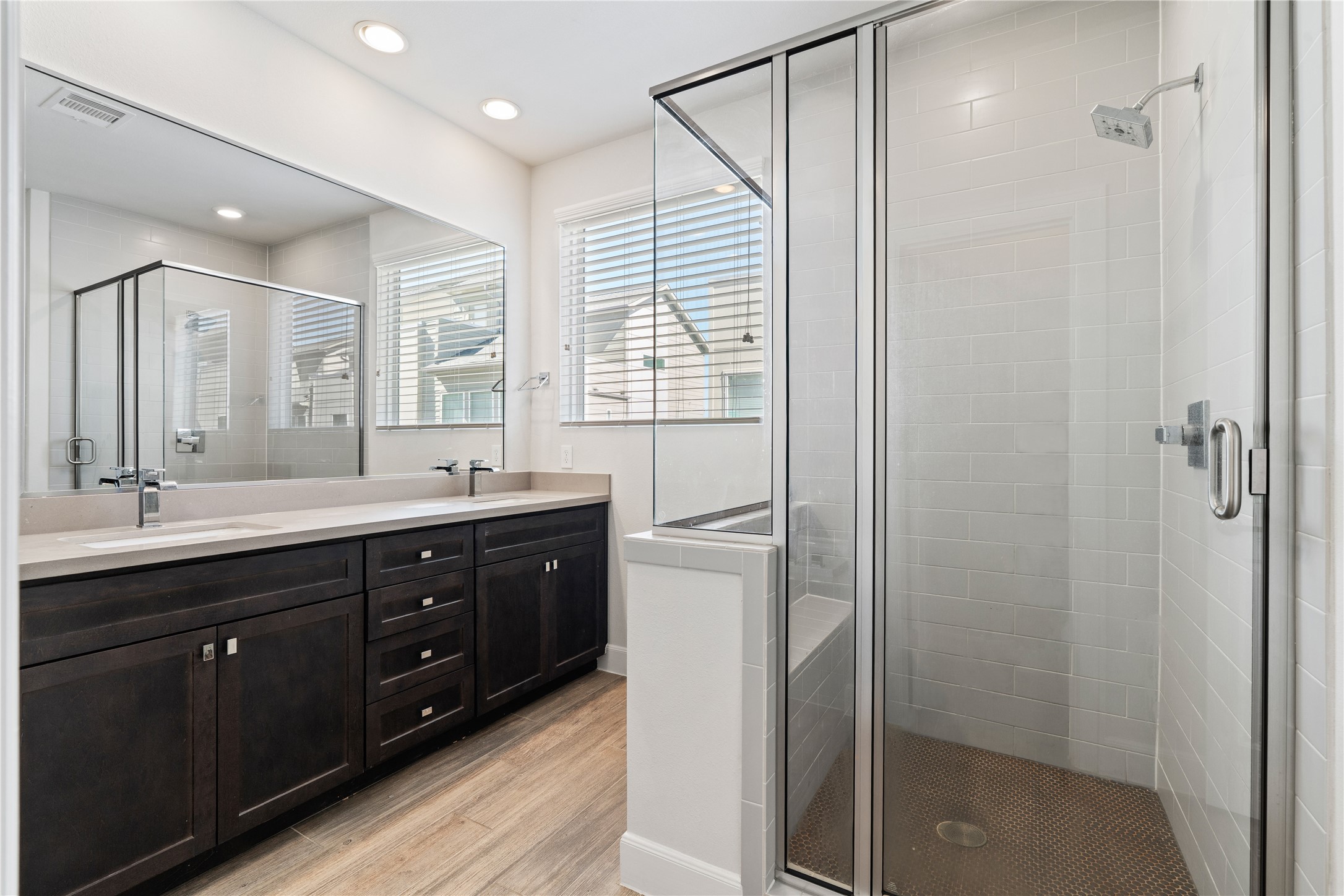 1013 West 17th Street Houston, TX 77008 - Photo 20 of 26 a bathroom with a sink double vanity and a shower
