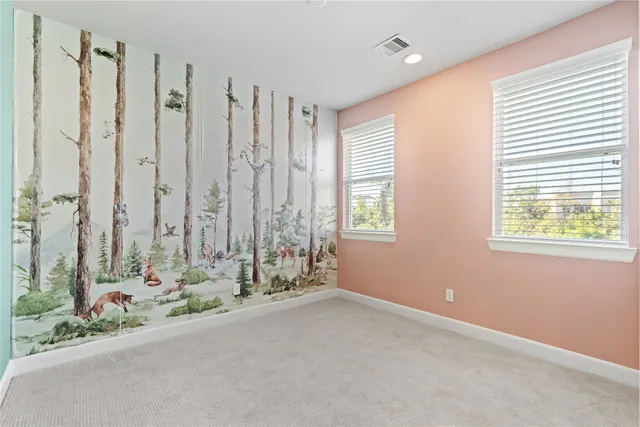 a view of a room with floor to ceiling window and couch