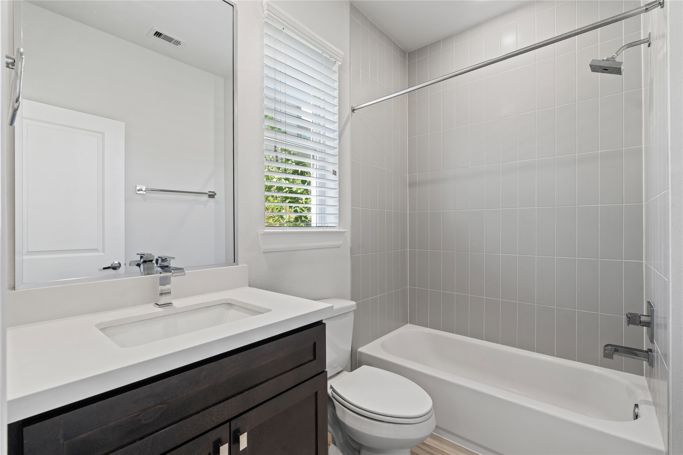 1013 West 17th Street Houston, TX 77008 - Photo 5 of 26 a bathroom with a sink a toilet and shower