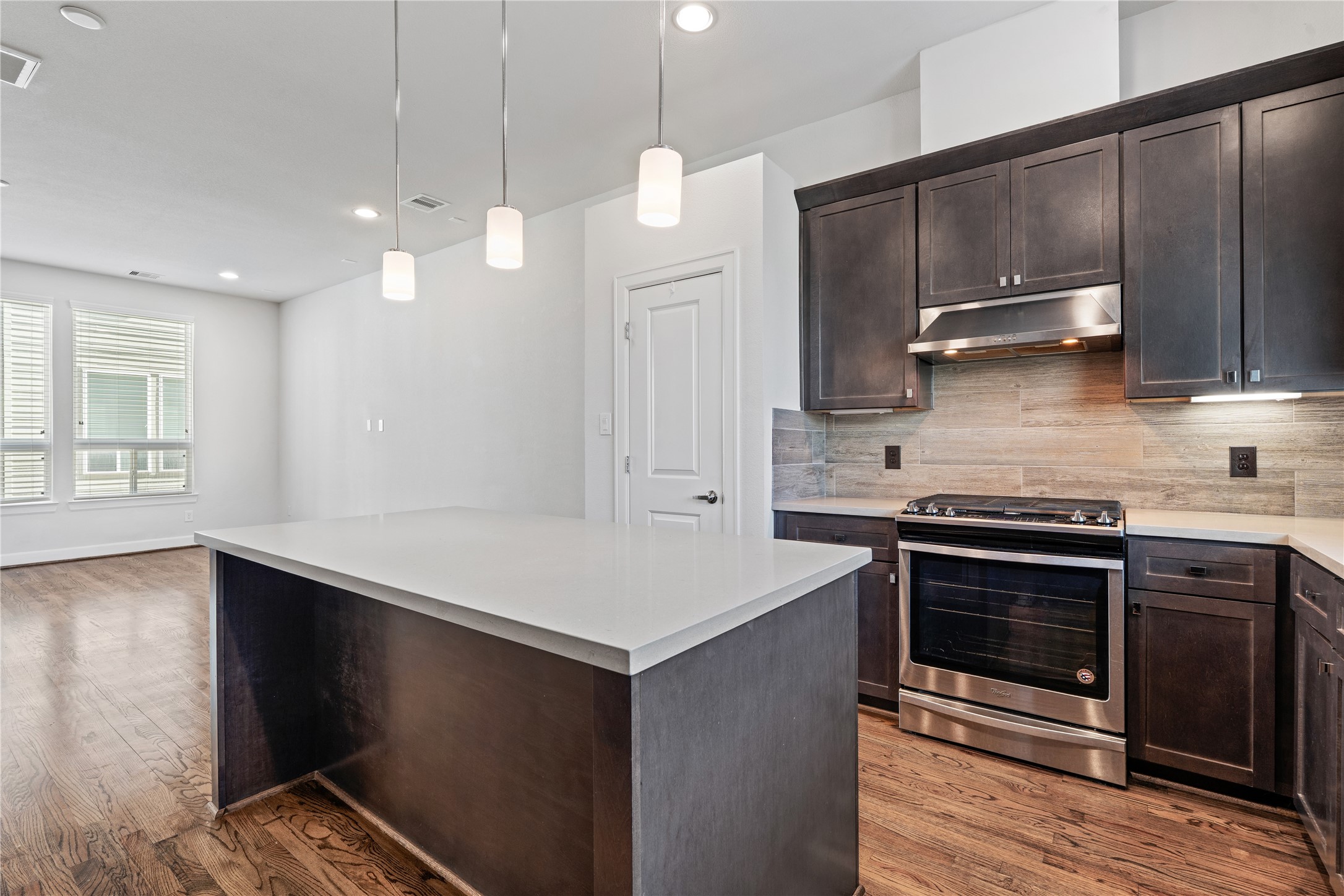 1013 West 17th Street Houston, TX 77008 - Photo 8 of 26 a kitchen that has a sink cabinets and stainless steel appliances