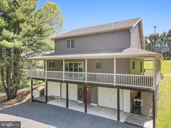 a front view of a house with a porch