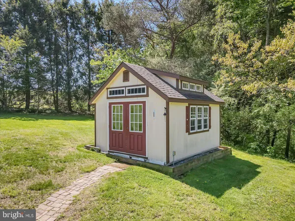 a front view of a house with yard