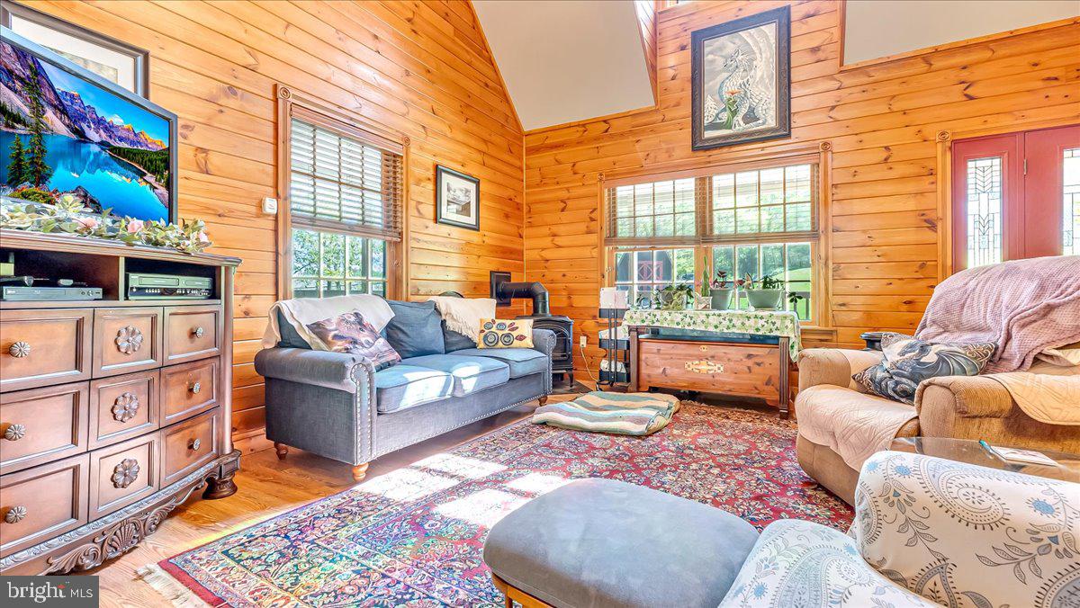172 Golf Course Road Sugarloaf, PA 18249 - Photo 3 of 23 a living room with furniture fireplace and a large window