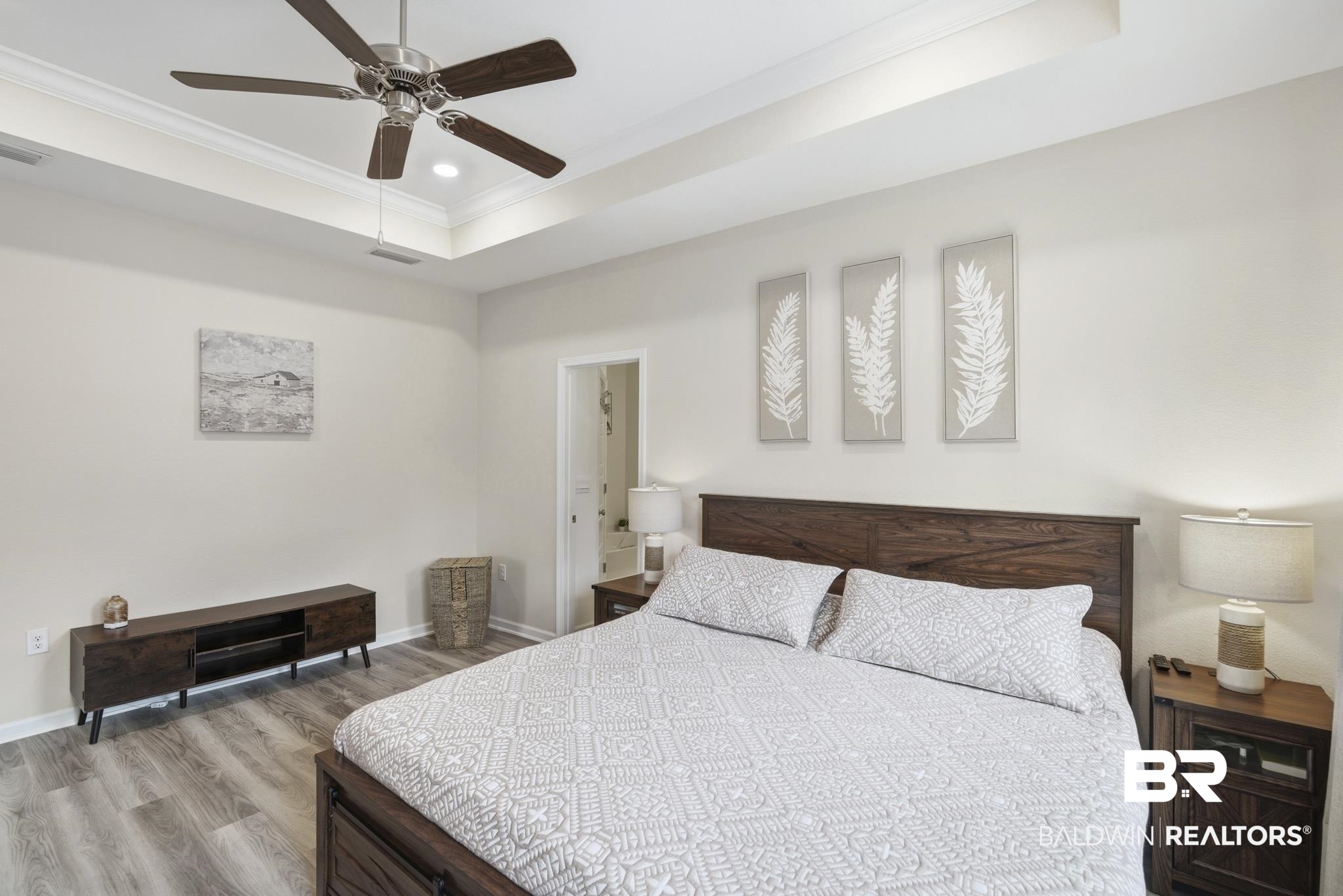 13887 Antler Hl Road Daphne, AL 36527 - Photo 18 of 50 Bedroom featuring a tray ceiling, ornamental molding, wood finished floors, a ceiling fan, and recessed lighting