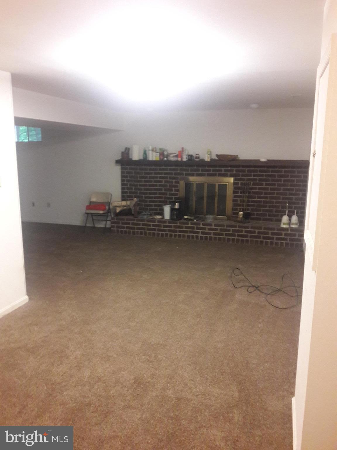 14927 Athey Road Burtonsville, MD 20866 - Photo 20 of 30 basement:: family rm with brick fireplace