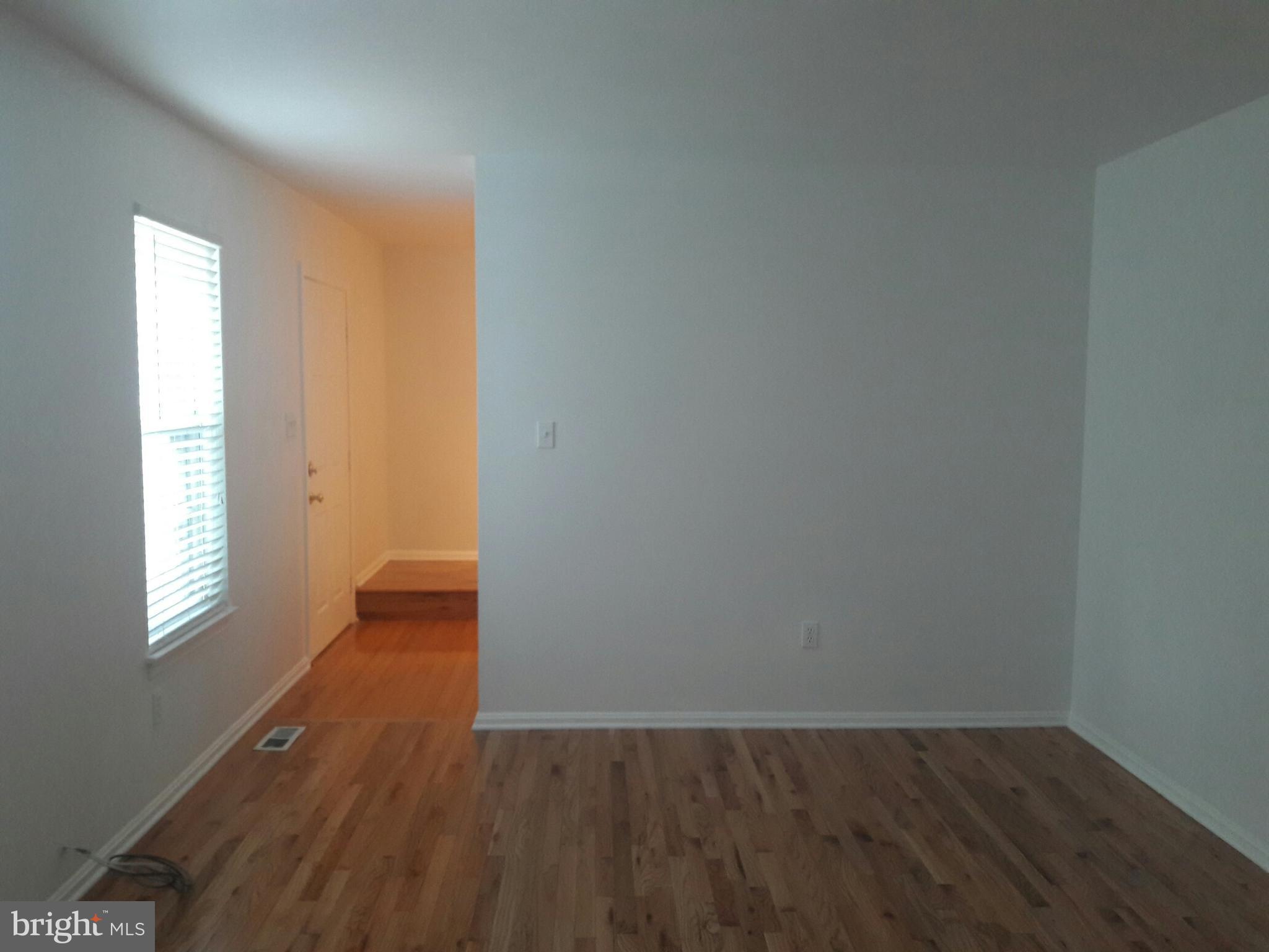 14927 Athey Road Burtonsville, MD 20866 - Photo 5 of 30 Family room with new wood floor
