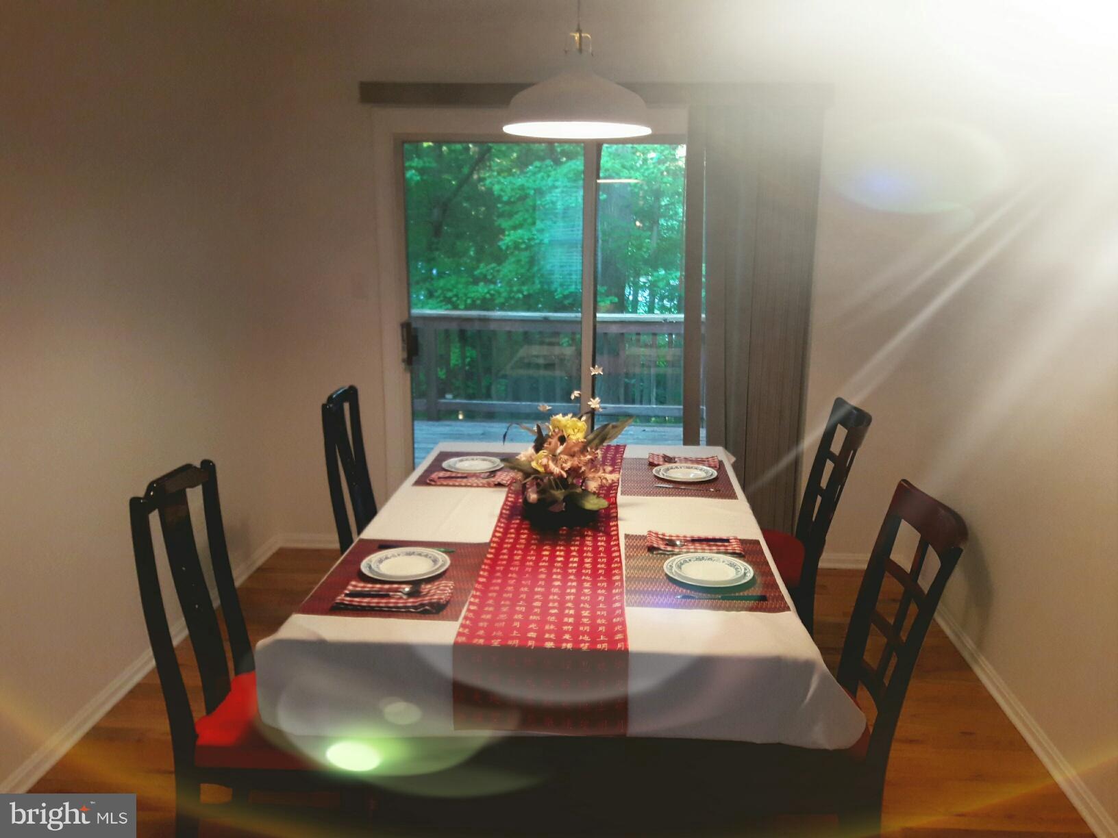 14927 Athey Road Burtonsville, MD 20866 - Photo 9 of 30 Dinning room & looking out to the Deck