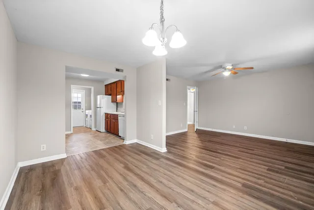 a view of a livingroom with wooden floor