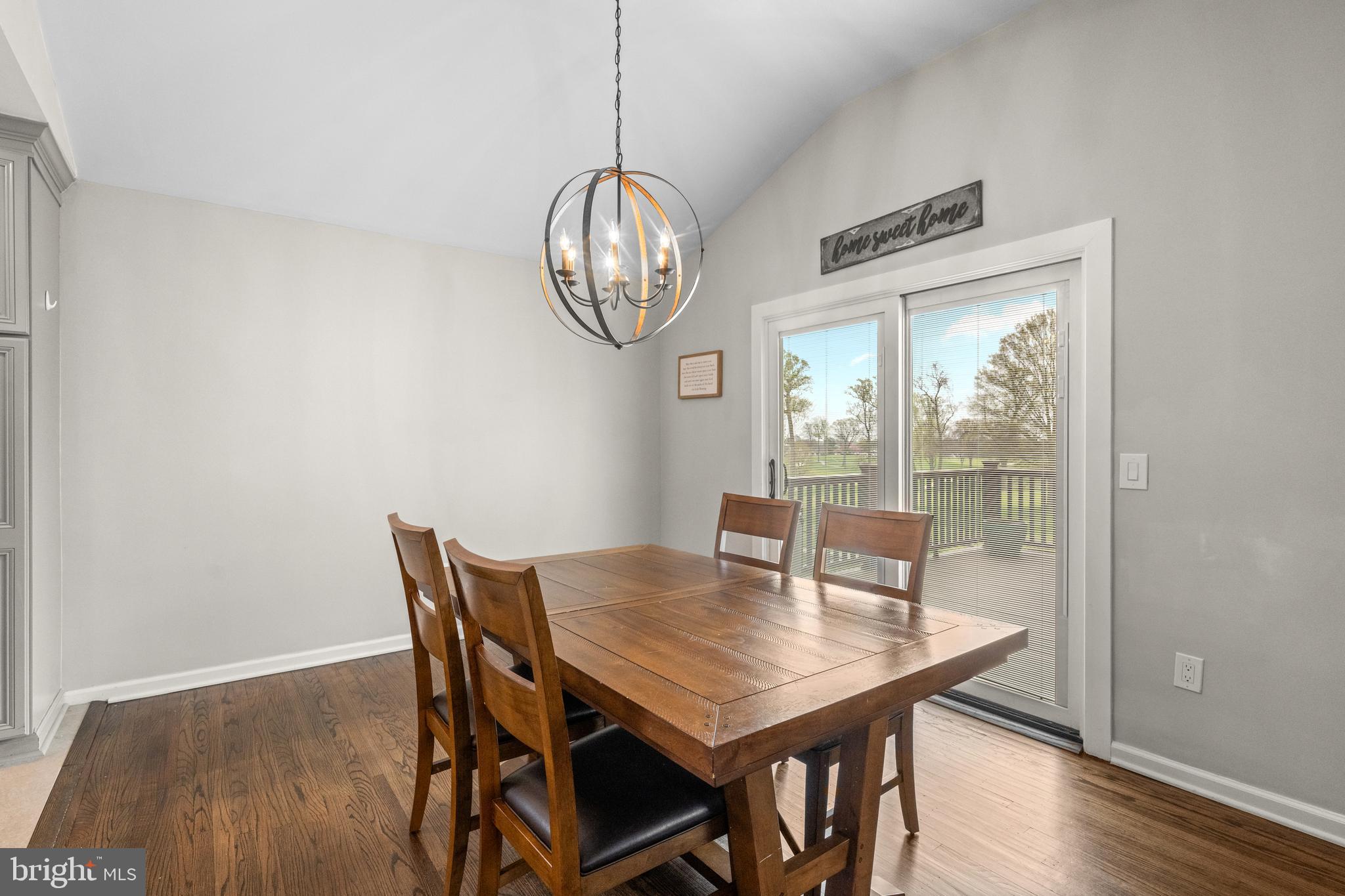 221 Hemlock Lane Springfield, PA 19064 - Photo 13 of 36 a view of a dining room with furniture window and wooden floor