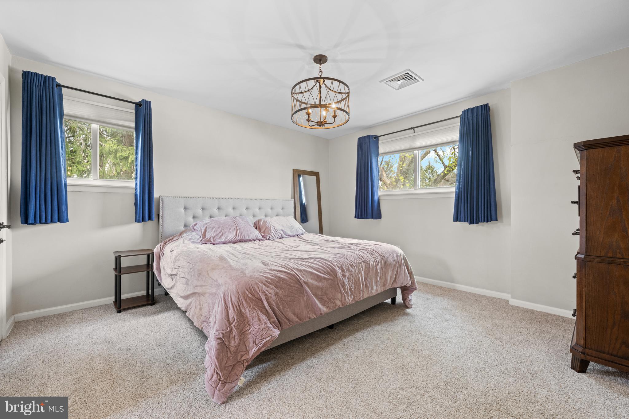 221 Hemlock Lane Springfield, PA 19064 - Photo 25 of 36 a bedroom with a bed and a window