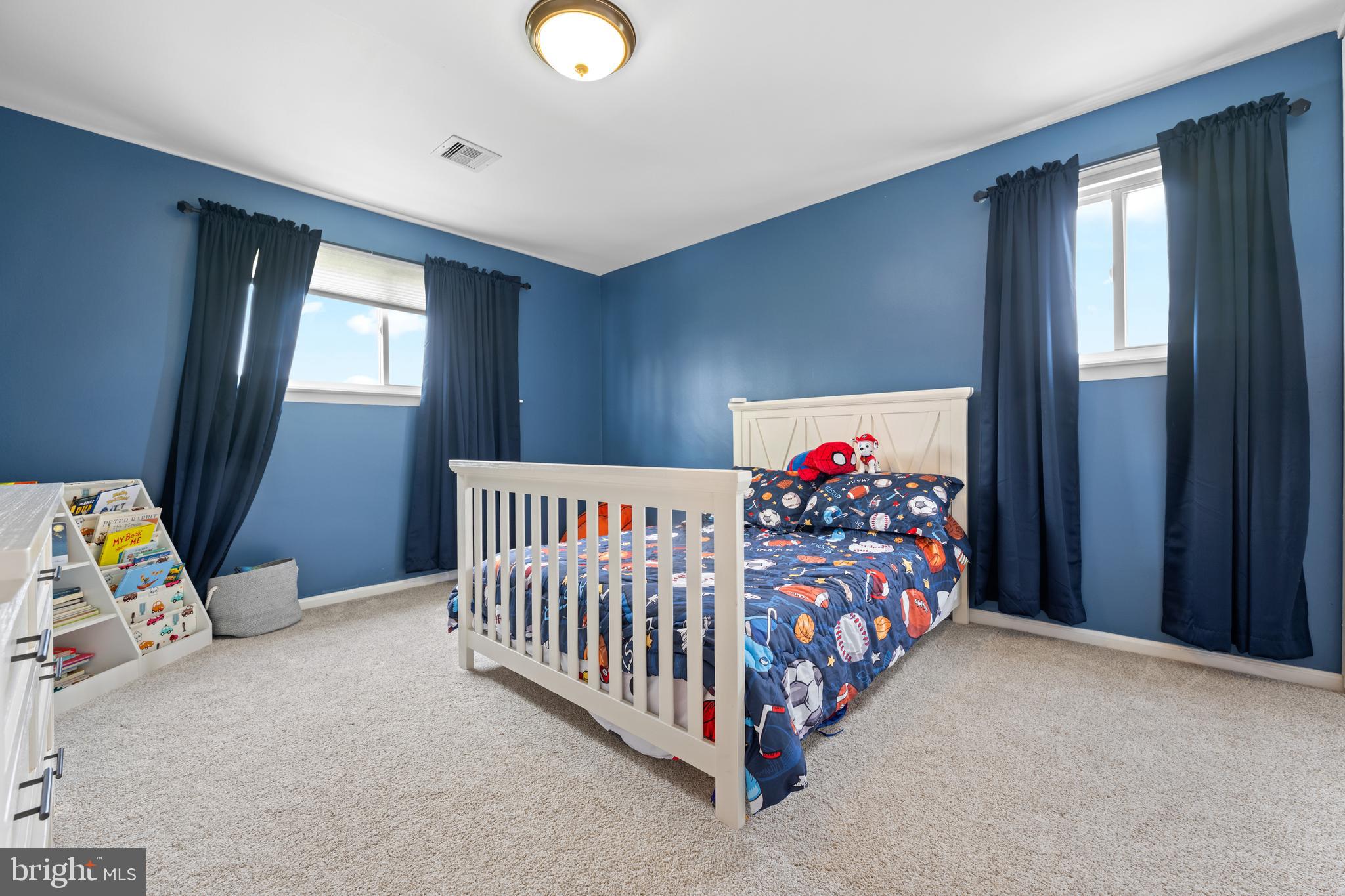 221 Hemlock Lane Springfield, PA 19064 - Photo 28 of 36 a bed room with a bed and a window