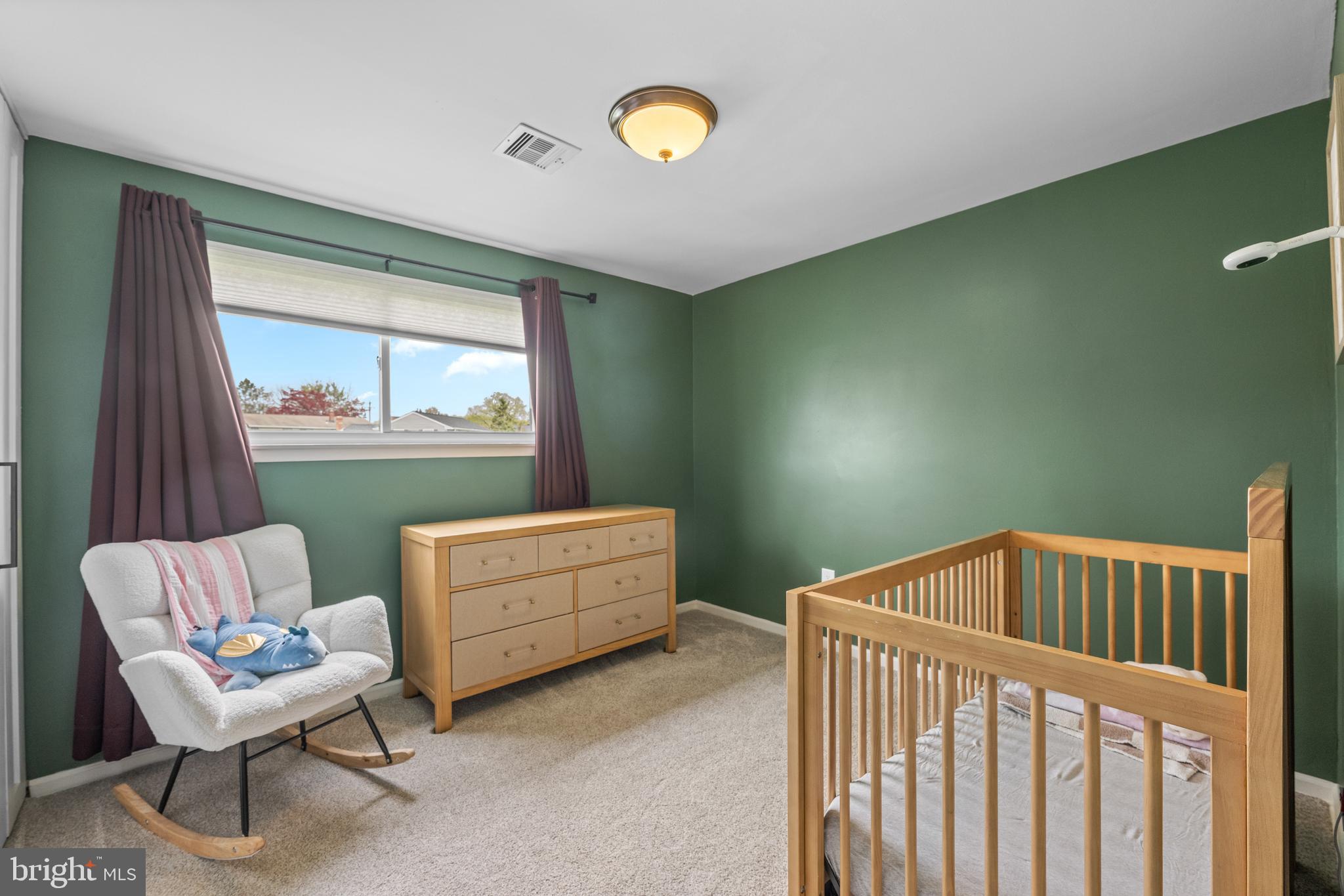 221 Hemlock Lane Springfield, PA 19064 - Photo 29 of 36 a bedroom with furniture and a window