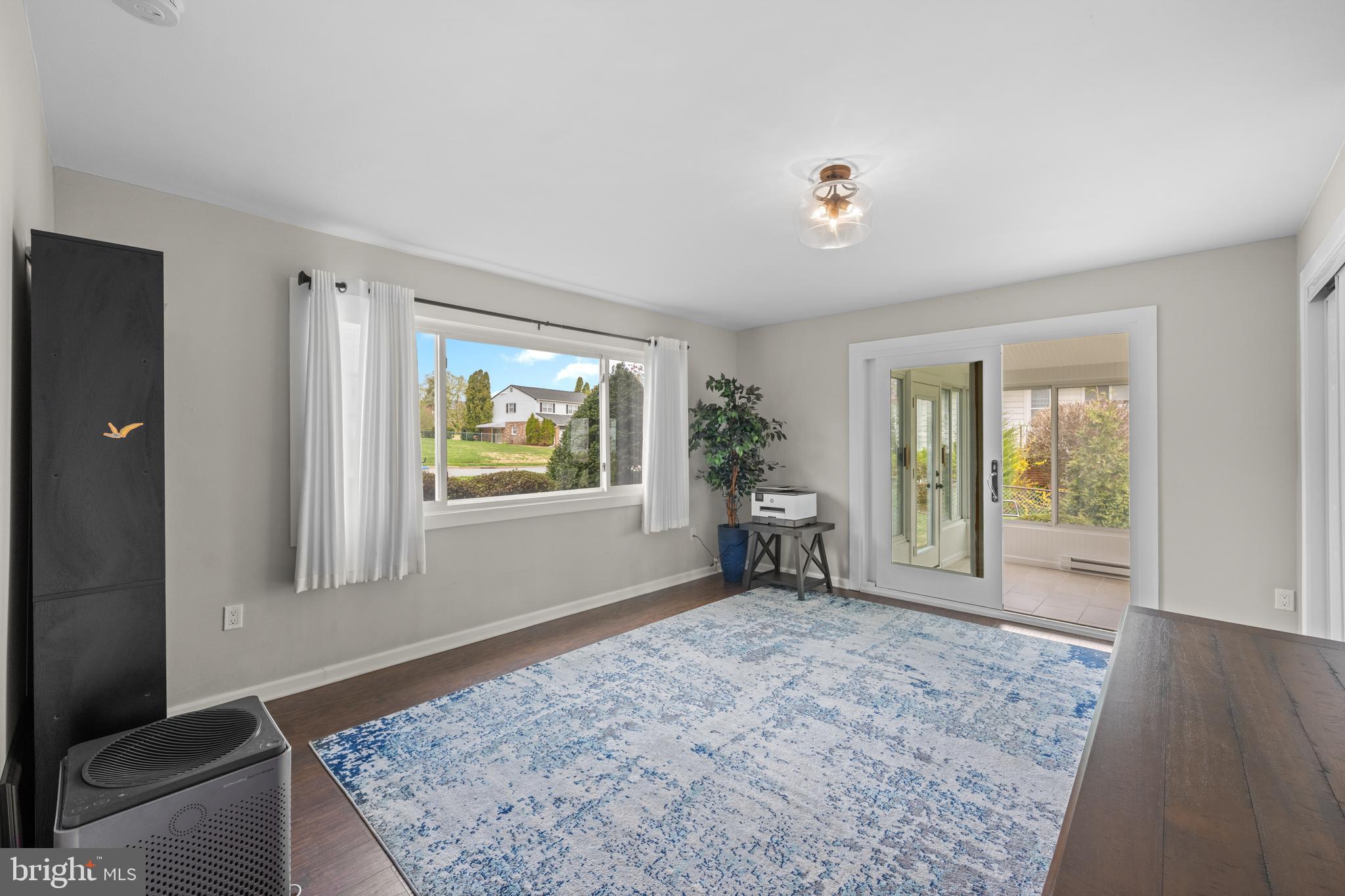 221 Hemlock Lane Springfield, PA 19064 - Photo 5 of 36 a view of an empty room and window