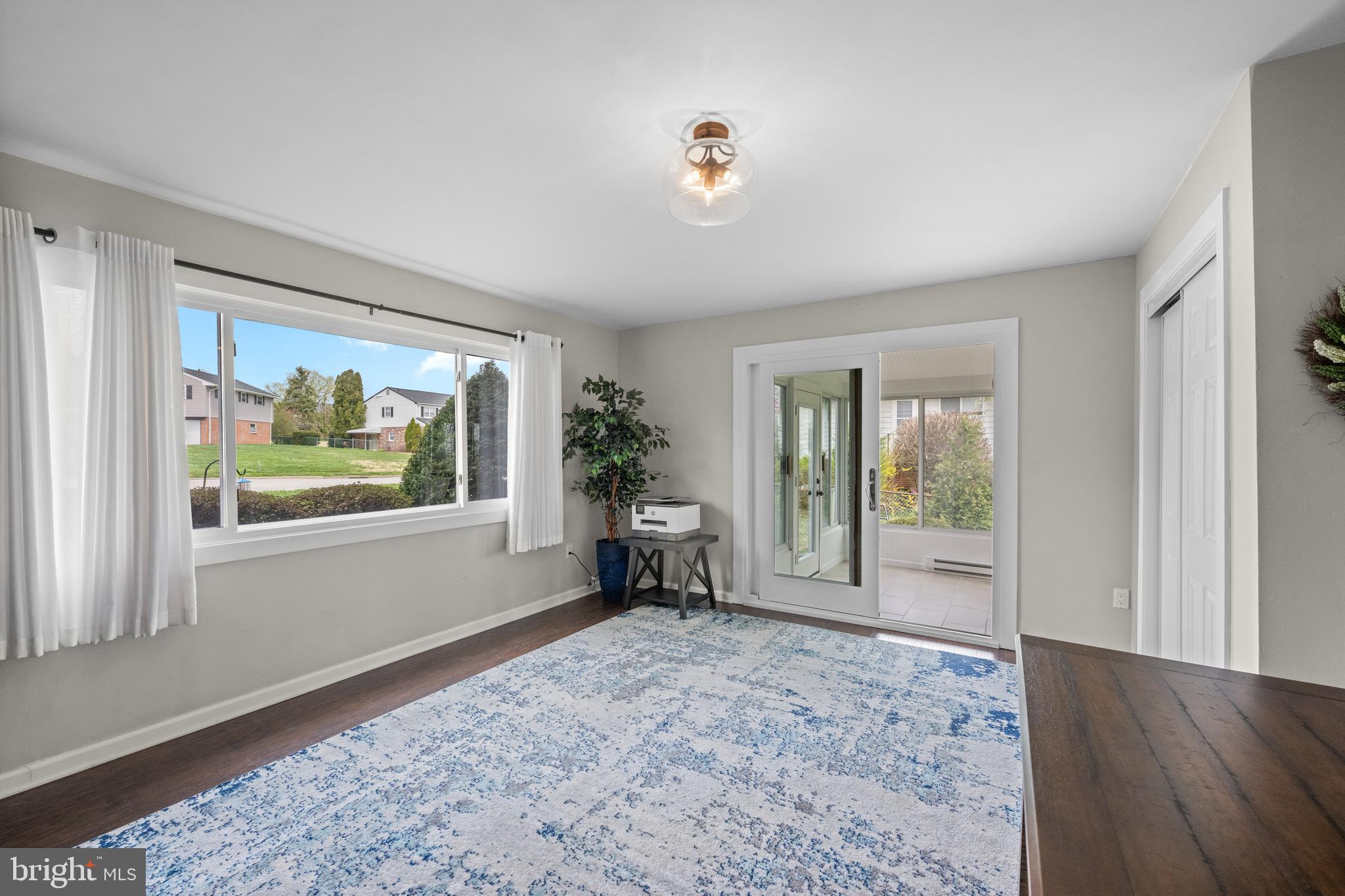 221 Hemlock Lane Springfield, PA 19064 - Photo 6 of 36 a living room with furniture and a window