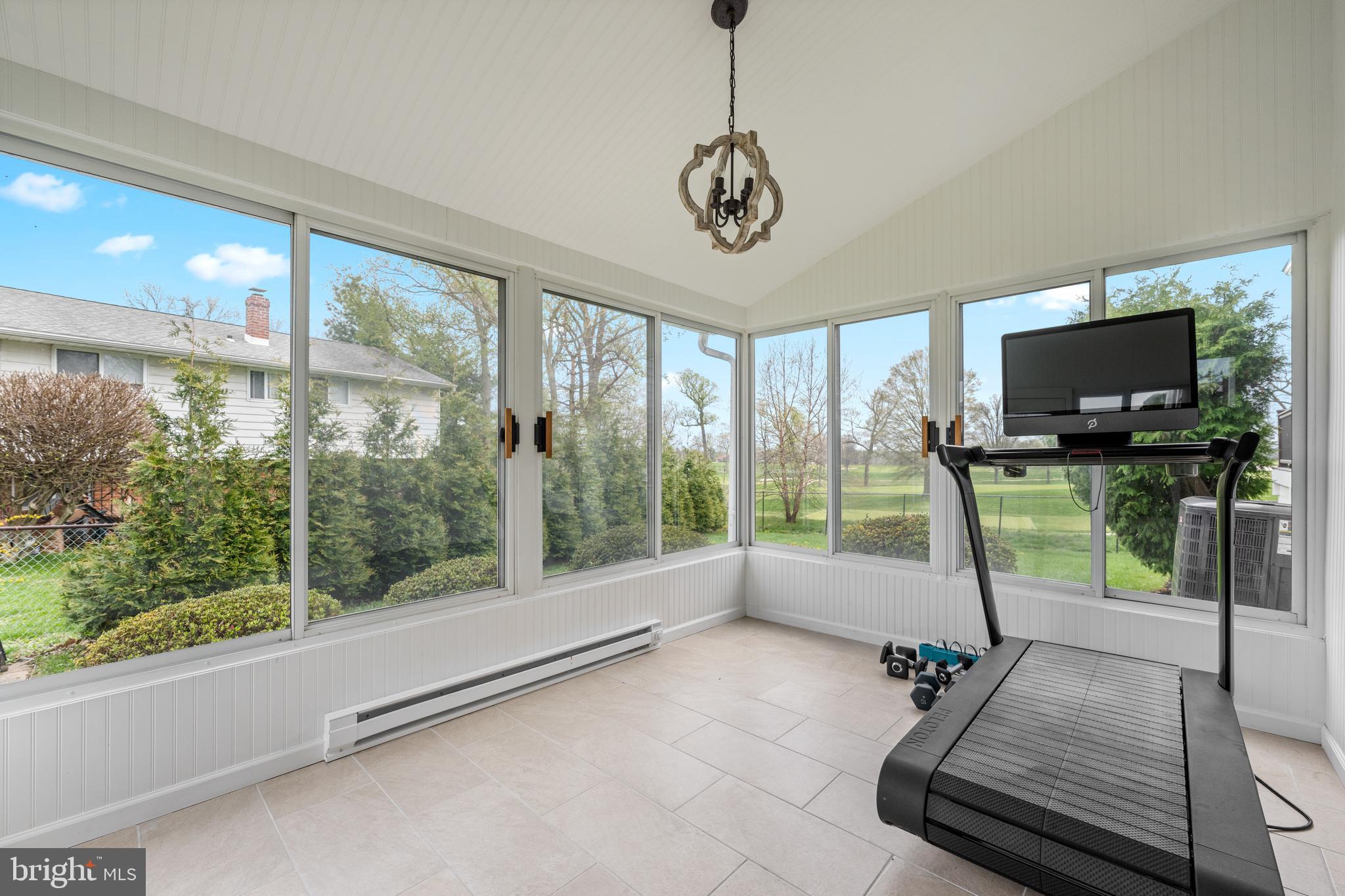 221 Hemlock Lane Springfield, PA 19064 - Photo 8 of 36 a living room with hardwood floor and flat screen tv
