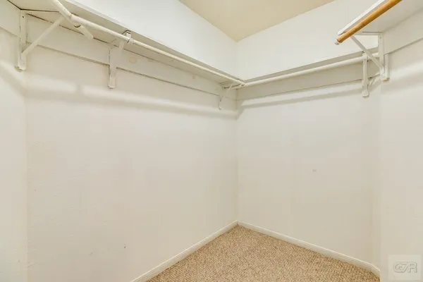 a small walk in closet