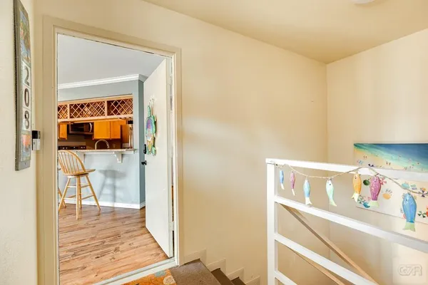 a view of a living room with a baby crib