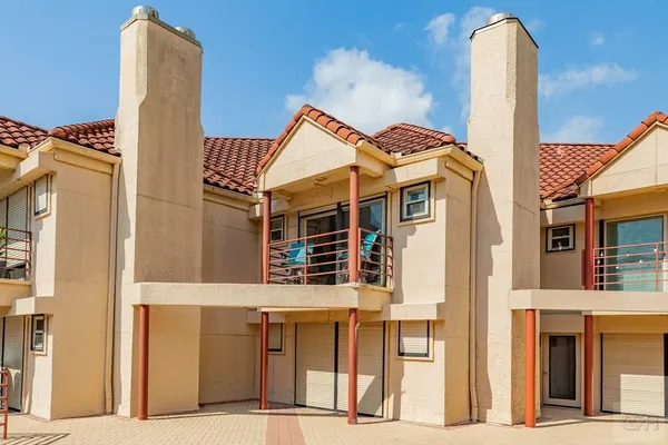 a front view of a building with a outdoor space