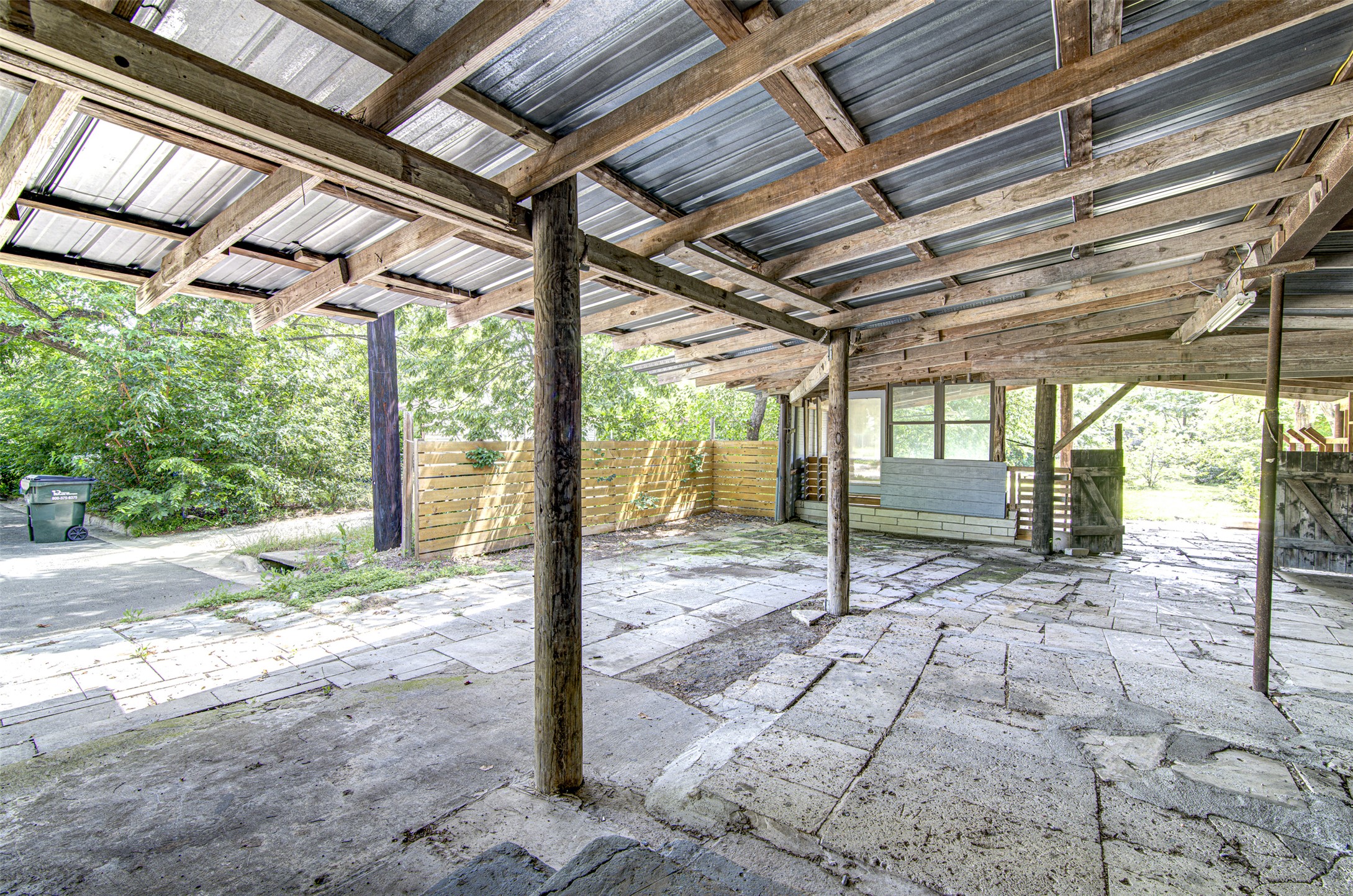 1807 San Jose Street Georgetown, TX 78626 - Photo 19 of 21 A spacious covered outdoor area, perfect for entertaining or additional sheltered parking.