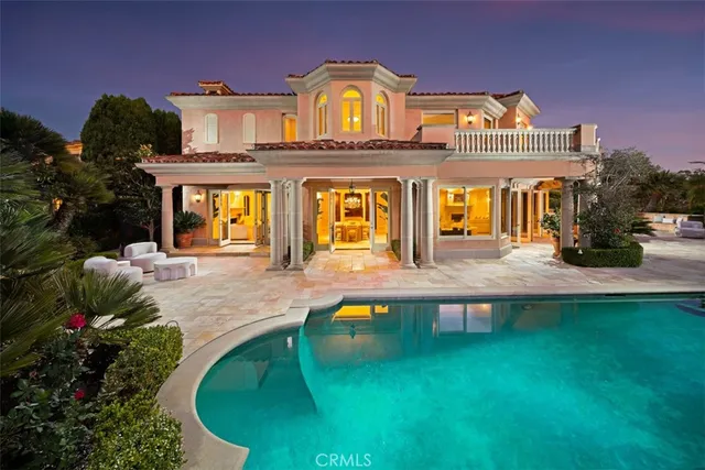 a view of a house with a swimming pool