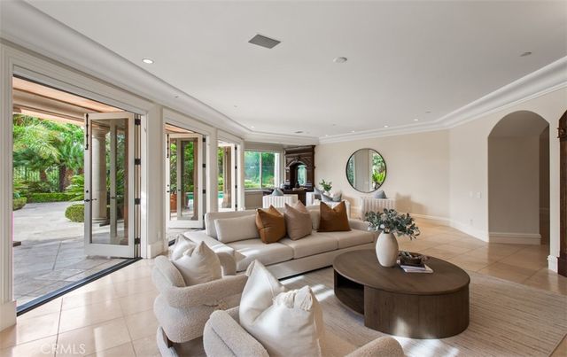 a view of a swimming pool with a yard