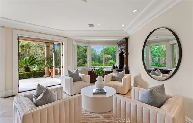 a view of a backyard with sitting area