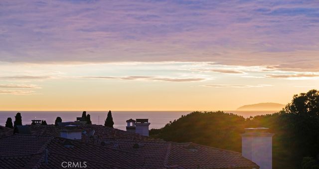 a view of a patio with couches and a fire pit