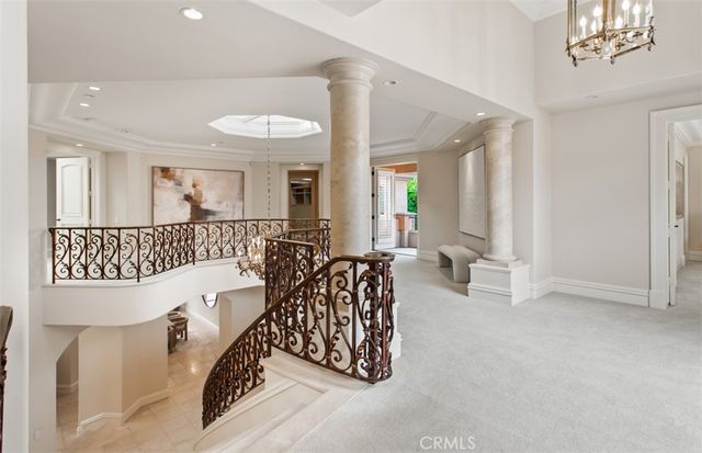 a room with a sink and a mirror