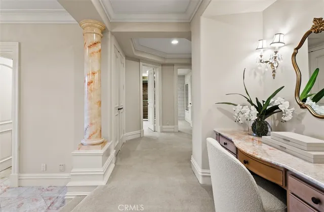 a en suite bathroom with double sink and a mirror